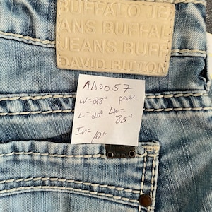 May include: A set of three ceramic mugs with a speckled, matte finish. The mugs are in shades of cream, light gray, and dark gray. Each mug has a simple, minimalist design, perfect for coffee or tea.