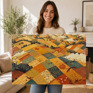 May include: A rectangular canvas print featuring a colorful, abstract landscape of patchwork fields in shades of yellow, orange, and green. The artwork depicts rolling hills with small houses and flying birds, creating a warm, inviting scene.