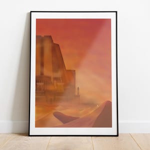 Könnte beinhalten: Gerahmter Kunstdruck, der eine Wüstenlandschaft mit einer Stadt im Hintergrund zeigt. Das Kunstwerk verwendet warme Töne von Orange, Rot und Gelb, mit hellem Licht, das die Szene durchdringt. Der Druck ist in einem schwarzen Rahmen.