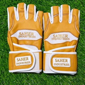 May include: A pair of fingerless gloves in mustard yellow and white. The gloves feature white mesh panels, mustard yellow leather-like sections, and white trim. The text SAHER INDUSTRIES is printed in gold on the back and the wrist strap.