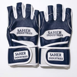 May include: A pair of fingerless gloves in navy blue and white. The gloves feature white mesh panels and navy blue leather sections. The text SAHER INDUSTRIES is printed on the back of the hand and on the white hook-and-loop wrist closure strap.