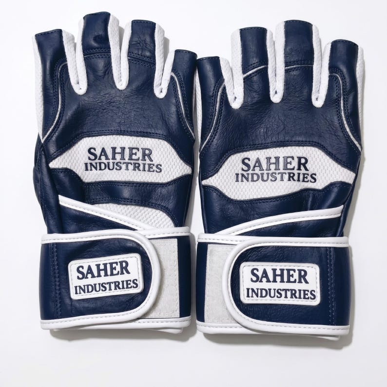 May include: A pair of fingerless gloves in navy blue and white. The gloves feature white mesh panels and navy blue leather sections. The text SAHER INDUSTRIES is printed on the back of the hand and on the white hook-and-loop wrist closure strap.