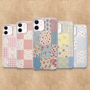 May include: Five clear phone cases with colorful patchwork designs. The patterns include floral, gingham, and polka dot motifs in shades of pink, blue, yellow, and red. The cases are arranged in a row, showcasing the variety of designs.