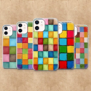 May include: Five phone cases with colorful square patterns. Each case features a different arrangement of squares in shades of red, blue, green, yellow, and brown. The cases have a clear border and a camera cutout.