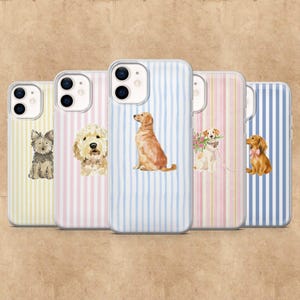 May include: Five phone cases with dog illustrations. Each case features a different breed, including a Yorkie, Goldendoodle, Golden Retriever, Labrador, and Dachshund. The cases have vertical striped backgrounds in pastel colours.