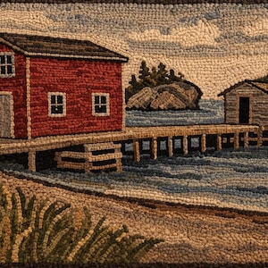May include: Hand-hooked rug showing a coastal scene with two wooden buildings on piers. The larger building is red with a dark roof, the smaller is light brown. The water is blue, and the sky is cloudy. The rug has a textured, handmade appearance.