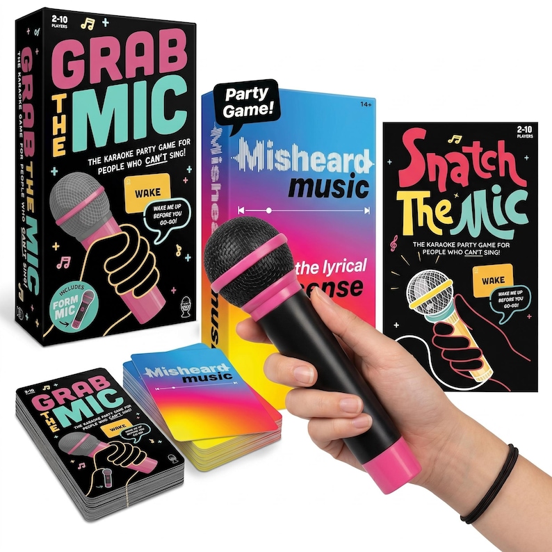 May include: A karaoke party game set featuring three game boxes with the titles "Grab the Mic" and "Snatch the Mic", and "Misheard Music". A black microphone with pink accents is held in front of the games. A deck of cards is also visible.