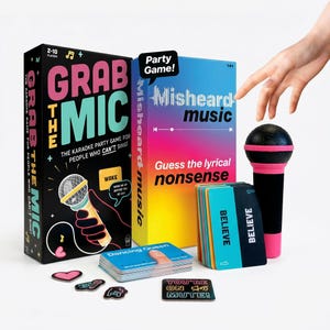 May include: Two party games, "Grab the Mic" and "Misheard Music," with colorful boxes and card decks. A black and pink microphone prop and game-related tokens are also present. The games are designed for 2-10 players.
