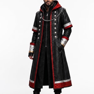 May include: A black long coat featuring a hood, red trim, and silver metallic accents. The coat includes a double-breasted front with silver buttons, a silver chain detail across the chest, and red and silver bands on the sleeves and hem.