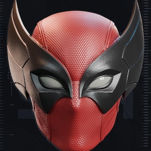 May include: A red and black mask with a textured surface, featuring large, stylized black wings on the sides. The mask has white eye openings and a distinctive design. The text "TEST PRINTED AMS COLORED STL" is visible.