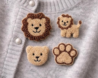 Conjunto de broches de león con aguja perforadora, colección de broches textiles hechos a mano, juego de cuatro piezas.