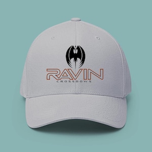 May include: A rustic wooden sign with the text "Welcome" in a handwritten style. The sign is painted white with a distressed finish, and features a decorative floral element in the corner. The background is a blurred image of a wooden surface.