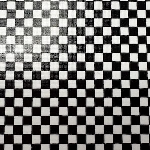 May include: A canvas surface featuring a repeating black and white checkerboard pattern. The grid consists of uniform square tiles arranged in a consistent layout across the entire visible area, creating a high-contrast geometric design.