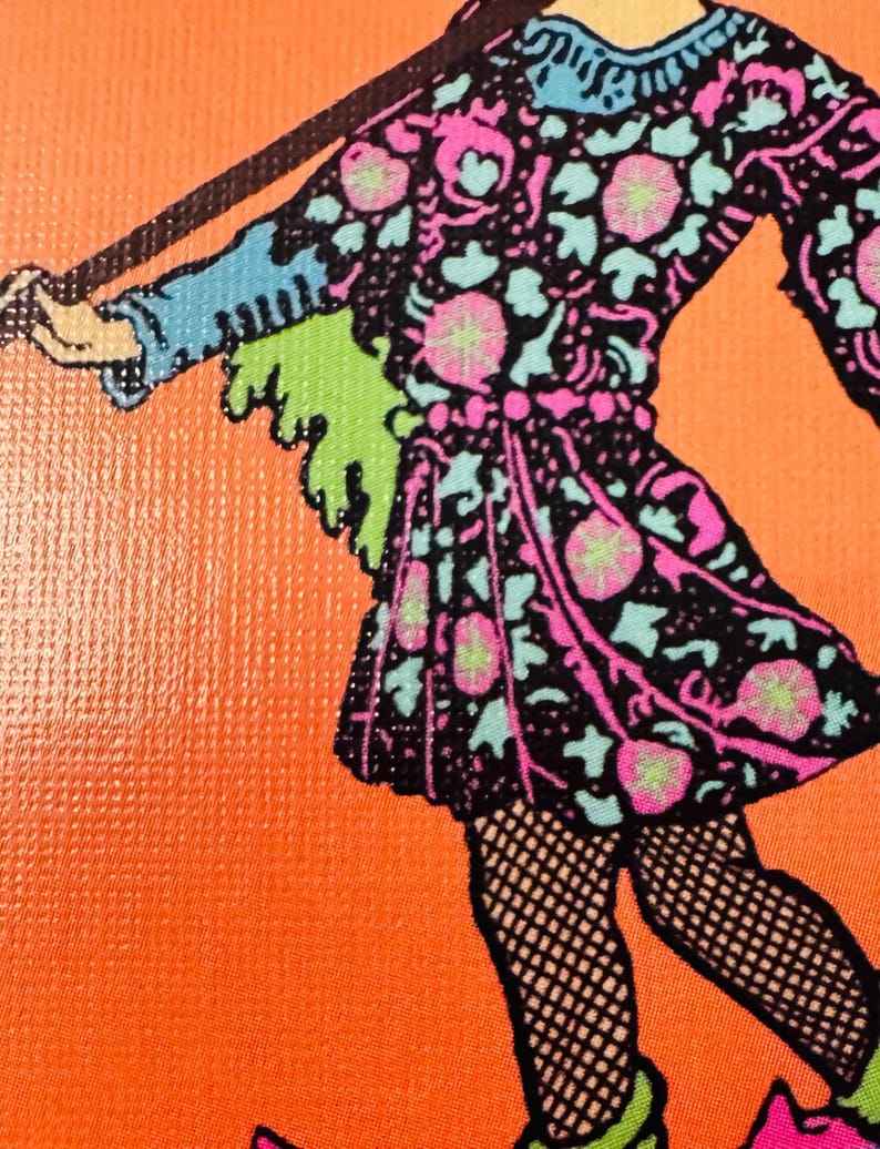 May include: A graphic illustration on an orange background featuring a figure wearing a black dress with a vibrant pink and light blue floral pattern. The figure has light blue sleeves, a green fringe detail, and black fishnet stockings.