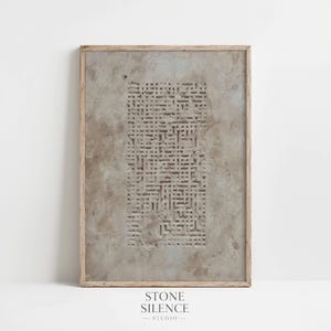 May include: A rectangular wall art piece in a light wooden frame featuring a textured, beige and gray surface. The center displays a vertical, recessed grid pattern with intricate, maze-like carved lines set against a mottled, earthy background.