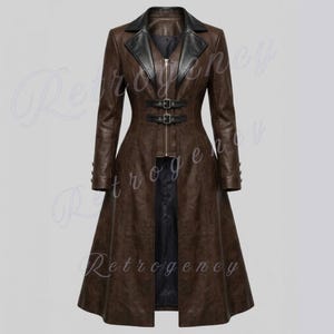 May include: A brown leather coat with a black collar and accents. The coat features a zipper closure, two buckle details at the waist, and a flared skirt. The long-sleeved coat has button details on the cuffs.