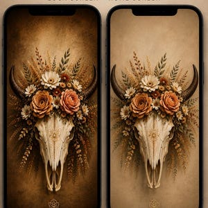 May include: Two smartphones displaying a digital wallpaper set titled Desert Sun BLOOM & WILD. The screens feature a central animal skull adorned with orange and white flowers, greenery, and dark horns against a textured brown background.