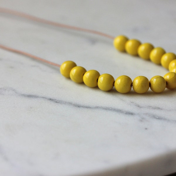 Handmade ceramic necklace, yellow beaded necklace