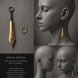 Pendiente con forma de plumilla de pluma estilográfica inspirado en la escritura, joyería minimalista dorada, pendiente individual asimétrico, hecho a mano por un artesano.