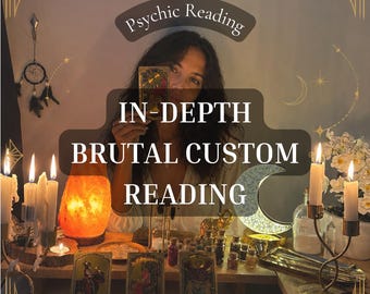 May include: A psychic reading service display featuring three tarot cards, a glowing orange salt lamp, white candles in gold holders, a crescent moon light, and small glass jars. The text reads Psychic Reading IN-DEPTH BRUTAL CUSTOM READING.