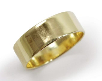 Trouwring. 14k geelgouden trouwring. trouwring. 7 mm brede trouwring. Extra dikke ringen. Unisex gouden band (gr-9333-982).