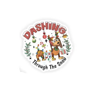 May include: A white sticker with a cartoon dog wearing reindeer antlers and festive lights. The sticker has the words "Dashing Through The Snow" in a red, playful font, with Christmas ornaments and a gift box.
