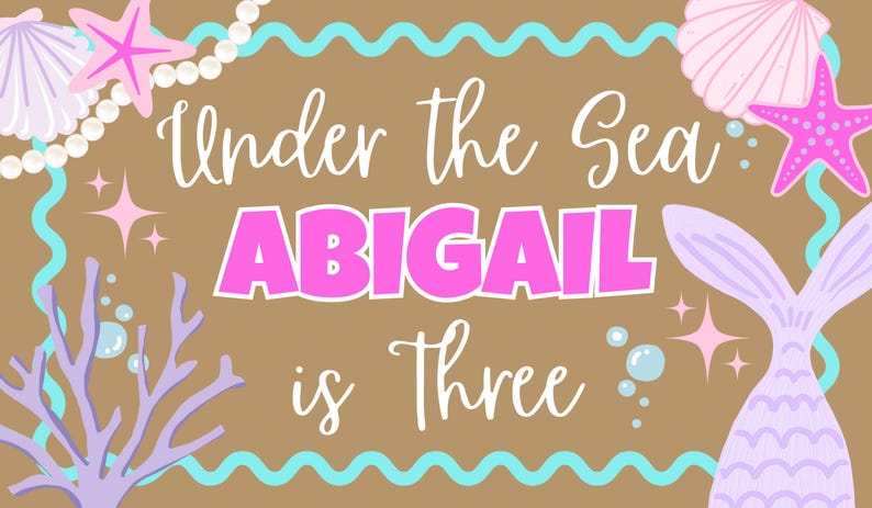 May include: A rectangular sign with a brown background and a light blue wavy border. The text reads Under the Sea ABIGAIL is Three in white and pink. Decorations include a pink starfish, a purple seashell, a mermaid tail, and white pearls.