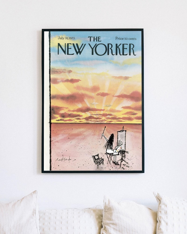May include: A framed magazine cover titled The New Yorker, dated July 16, 1973, priced at 50 cents. The illustration depicts a person painting at an easel in a vast, pink-toned landscape under a sunset sky with yellow and orange clouds.