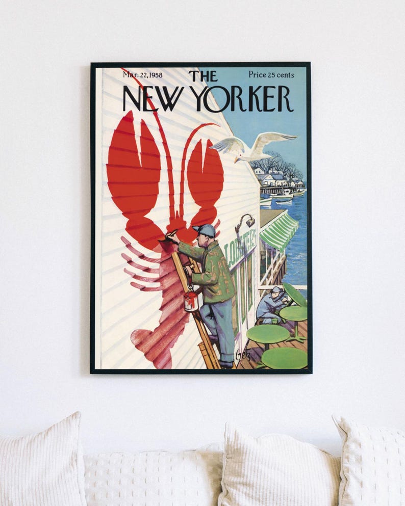 May include: Framed print of a vintage New Yorker magazine cover from March 22, 1958. The cover art shows a large red lobster painted on a building, with a man on a ladder painting it. A seagull flies nearby.