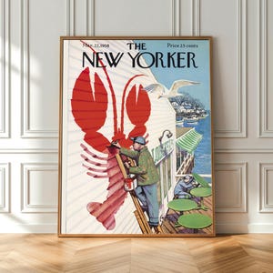 May include: A framed vintage New Yorker magazine cover from March 22, 1958, with a red lobster illustration. The cover art shows a man painting a building with a seagull flying above. The magazine title is in bold black letters.