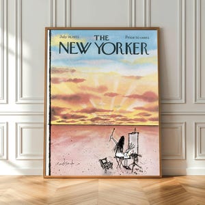 May include: A framed print of The New Yorker magazine cover dated July 16, 1973. The illustration depicts a person painting at an easel in a vast, flat landscape under a sunset sky with pink, orange, and yellow clouds. The text reads The New Yorker.