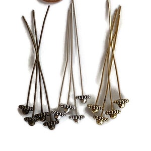 12 fancy tip head pins bronze