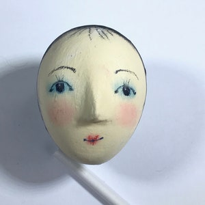 small oval doll head hand painted face  plaster