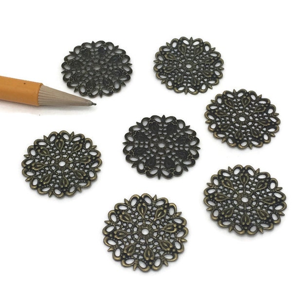 10-  large filigree spacer bead in antique bronze  25 mm round