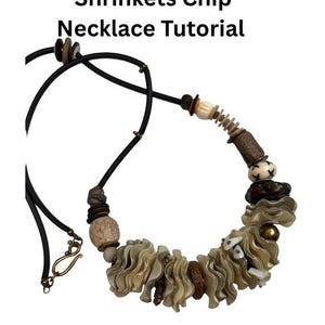 May include: A handmade necklace featuring a variety of natural elements. The necklace includes beige, brown, and white beads, along with a series of wavy, chip-like pieces. The necklace is strung on a black cord and has a gold-colored clasp. The text "Shrinkets Chip Necklace Tutorial" is at the top.