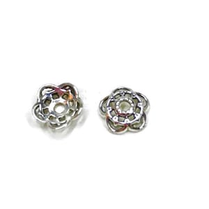 40,   bead caps -silver cast metal