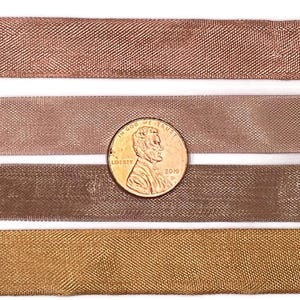 8 yards -peach  colored rayon  seam binding ribbon