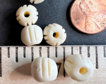 10-bone bead , carved  , natural ivory color  10mm