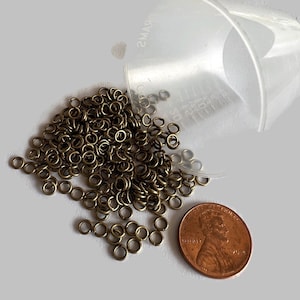 4 mm bronze jump rings  1/4 ounce