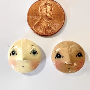 tiny doll head hand painted  face by julie haymaker , cabochon face , hand made doll head fits a  16mm bezel setting