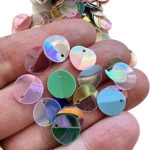 1 ounce, 10 mm round folded sequins with top hole