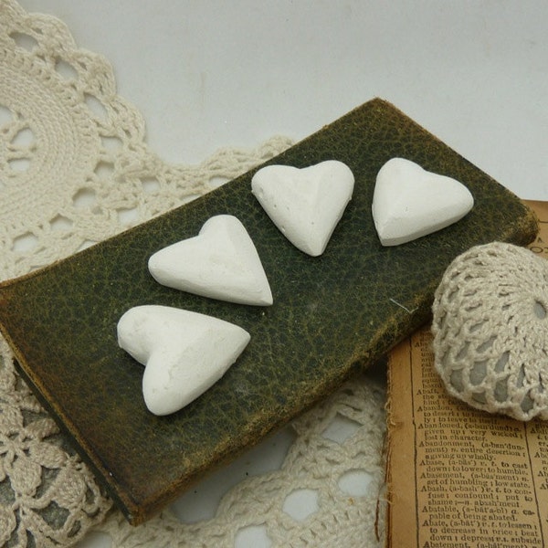 4 tiny folk hearts hand cast plaster