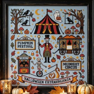 May include: A framed cross-stitch sampler on light blue fabric featuring a Halloween circus theme. Elements include a red and black striped tent, a skeleton ringmaster, a ticket booth, a wagon, and text reading Pumpkin Festival, Midnight Circus, and Halloween Extravaganza.