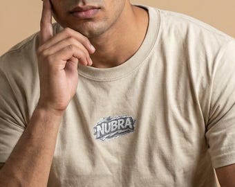 Minimalist Streetwear Logo T-Shirt, Vintage Style Graphic Tee, Small Chest Print Shirt, Urban Casual Unisex Tee, Basic Shirt, Nubra