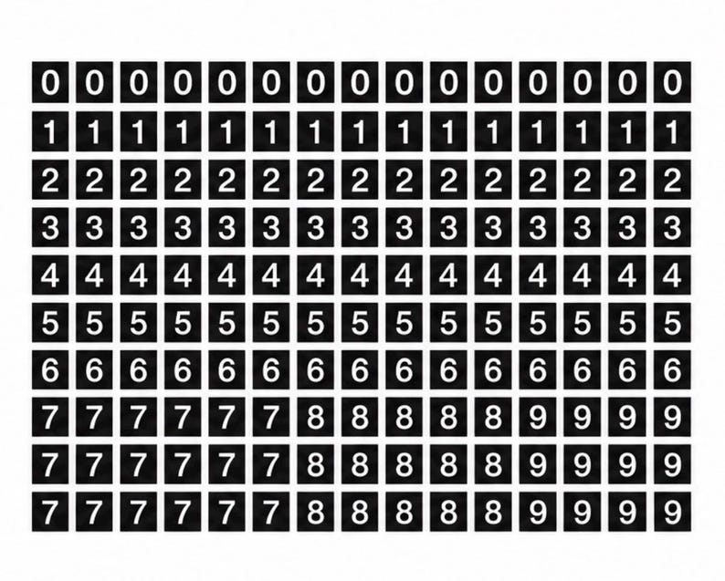 May include: A grid of black square tiles, each featuring a single white numeral. The rows display the numbers zero through seven, with the bottom three rows containing repeating sequences of seven, eight, and nine in a structured, uniform layout.