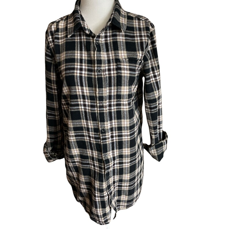 May include: A black and white plaid flannel shirt with long sleeves and a button-up front.