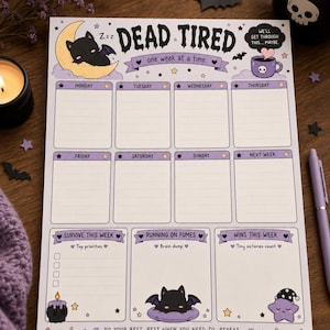 May include: A weekly planner notepad with a white background and purple accents. The header reads DEAD TIRED one week at a time. It features sections for each day of the week, plus boxes for Top priorities, Brain dump, and Tiny victories count.