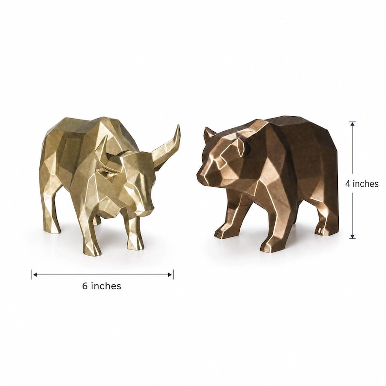 A gold geometric bull and a bronze geometric bear statue are shown with measurement lines indicating the bull is 6 inches long and both are 4 inches tall.
