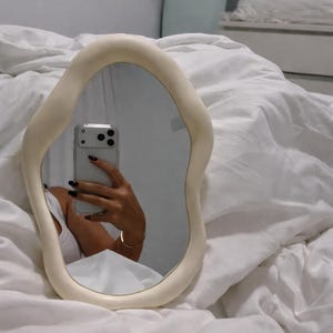 Vanity Mirror: Cream Wavy Frame, Minimalist Style (Modern Bedroom)