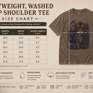 May include: A brown, heavyweight, washed drop shoulder t-shirt featuring a tiger graphic. The image includes a size chart with measurements in inches for sizes S through 3XL, along with icons detailing the garment's fit, fabric, and care instructions.